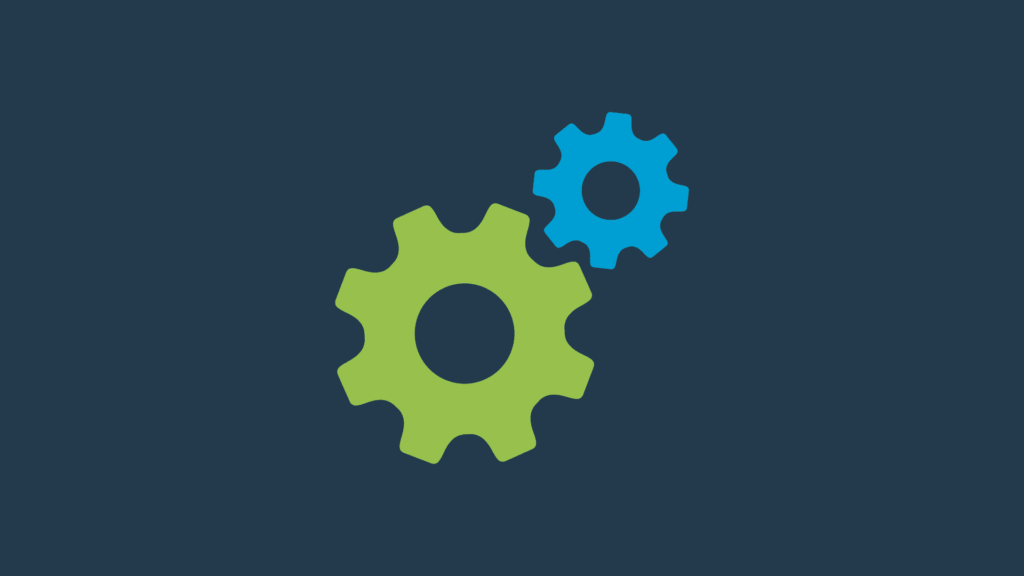 Two interlocking gears, one green and one blue, against a dark blue background.